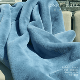 Indulge in the epitome of luxury with the One Preevay Faux Rabbit Fur Throw in Yacht Blue. Inspired by the elegance of Fernando Botero and crafted from ultra-premium faux rabbit fur. Hypoallergenic, cruelty-free, and lined with elegant velvet for refined warmth and sophistication. 800gsm, 50x60 inches stunning