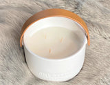 Discover the Lavender and Vanilla Perfumed Estate Candle from One Preevay. Handcrafted with premium essential oils and soy wax, it features a porcelain bowl with a silver-plated lid and leather strap. With a triple wick and 15.8 oz size, enjoy the aromatic blend of lavender and vanilla. Order now to elevate your ambiance.