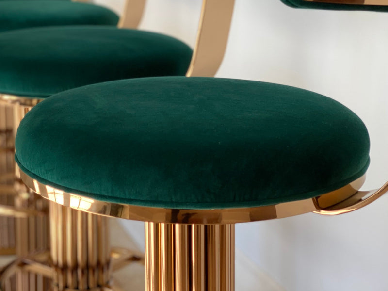 Discover the Atlas Bar Stool by One Preevay, inspired by the Chrysler Building. Customizable with textured bronze metal and plush velvet. Perfect for luxury residences and upscale spaces close up
