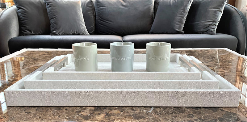 Luxury shagreen serving tray with inlaid nickel handles and ivory velvet underside"
Thursby Shagreen Hotel Tray - exotic embossed leather and nickel accents"
3. "High-end serving tray with shagreen leather, inlaid nickel handles, and velvet underside" "Luxury entertaining tray - Thursby Shagreen, embossed leather, nickel handles"
5. "Shagreen leather serving tray with inlaid nickel handles and elegant design"
Luxury serving trays
Shagreen leather trays