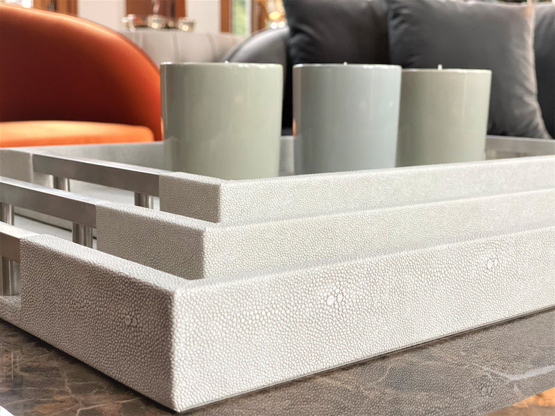 Discover the Thursby Shagreen Hotel Tray from One Preevay—a luxurious serving tray crafted with exotic embossed leather and nickel hardware. Available in three sizes: 17"x10", 20"x13", and 23"x15". Elevate your entertaining experience sophistication and style. Order now.
