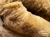 Ribbed Faux Rabbit & Velvet Blanket Collection by One Preevay Luxury Home Furnishings & Decor. Inspired by the regal Robe Royal, each hand-stitched piece features premium cruelty-free faux rabbit fur with elegant velvet underside, available in four luxurious colors: Elegant Black, Warm Beige, Classic Navy, and Dramatic Gray. Sizes: Twin (60" x 90"), Queen (90" x 90"). Hypoallergenic, soothing ribbed design for relaxation and easy care. Cruelty-free luxury, unmatched craftsmanship and detail beige color