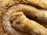 Ribbed Faux Rabbit & Velvet Blanket Collection by One Preevay Luxury Home Furnishings & Decor. Inspired by the regal Robe Royal, each hand-stitched piece features premium cruelty-free faux rabbit fur with elegant velvet underside, available in four luxurious colors: Elegant Black, Warm Beige, Classic Navy, and Dramatic Gray. Sizes: Twin (60" x 90"), Queen (90" x 90"). Hypoallergenic, soothing ribbed design for relaxation and easy care. Cruelty-free luxury, unmatched craftsmanship and detail in beige