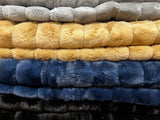 Ribbed Faux Rabbit & Velvet Blanket Collection by One Preevay Luxury Home Furnishings & Decor. Inspired by the regal Robe Royal, each hand-stitched piece features premium cruelty-free faux rabbit fur with elegant velvet underside, available in four luxurious colors: Elegant Black, Warm Beige, Classic Navy, and Dramatic Gray. Sizes: Twin (60" x 90"), Queen (90" x 90"). Hypoallergenic, soothing ribbed design for relaxation and easy care. Cruelty-free luxury, unmatched craftsmanship and detail and colors 