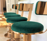 Discover the Atlas Bar Stool by One Preevay, inspired by the Chrysler Building. Customizable with textured bronze metal and plush velvet. Perfect for luxury residences and upscale venue