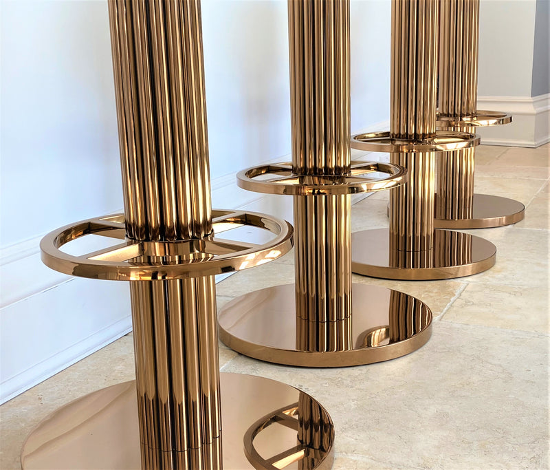 Discover the Atlas Bar Stool by One Preevay, inspired by the Chrysler Building. Customizable with textured bronze metal and plush velvet. Perfect for luxury residences and upscale venues. Minimum order 2