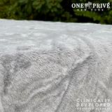 Experience luxurious relaxation with One Preevay's world's first weighted faux rabbit fur blanket, inspired by Fernando Botero. Clinically developed, 20lbs, hypoallergenic, and luxurious.....