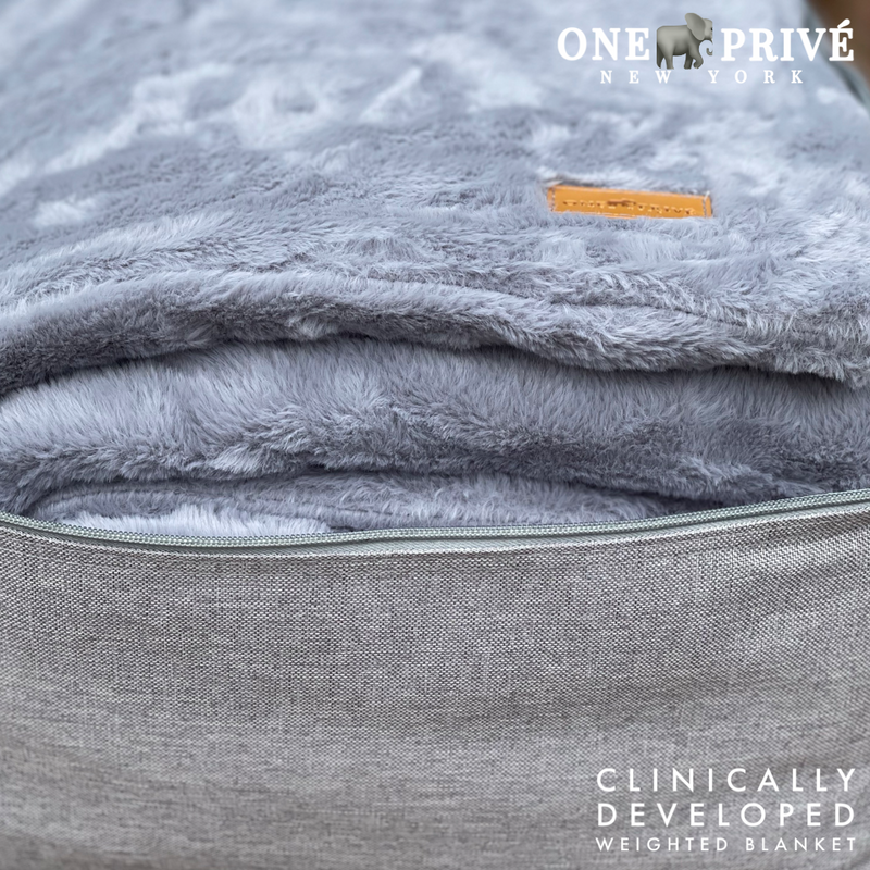Experience luxurious relaxation with One Preevay's world's first weighted faux rabbit fur blanket, inspired by Fernando Botero. Clinically developed, 20lbs, hypoallergenic, and luxurious for serene sleep & relaxation.....