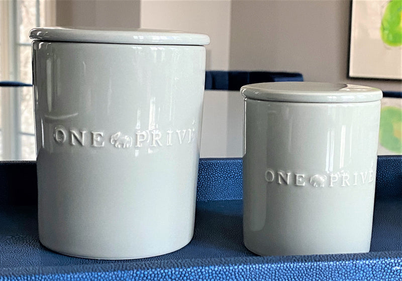Indulge in the French Black Orchid Perfumed Estate Candle from One Preevay. Handcrafted with premium essential oils and organic soy wax, it features a pale gray ceramic vessel. With a triple wick and 21.2 oz size, enjoy the aromatic blend of blackberry, patchouli, and spices. Elevate your ambiance today as stunning as they are
