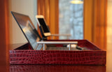 Upgrade your remote work setup with the Professional Portable Work Station in premium red embossed leather. Highly durable and lightweight, it features dual access ports for versatility. Available in three sizes. Order now for peak productivity......
