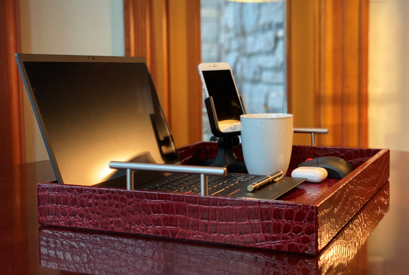 Upgrade your remote work setup with the Professional Portable Work Station in premium red embossed leather. Highly durable and lightweight, it features dual access ports for versatility. Available in three sizes. Order now for peak productivity.
